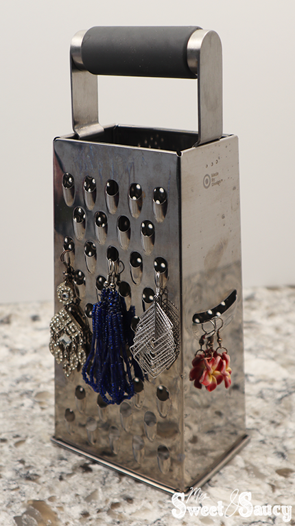 cheese grater with earrings