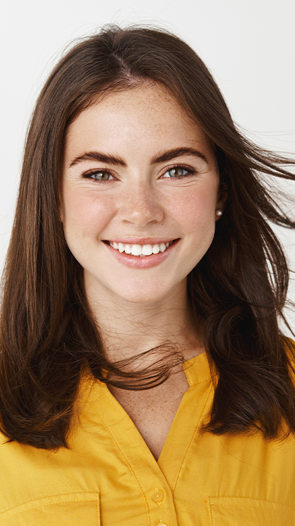 brown haired girl in yellow