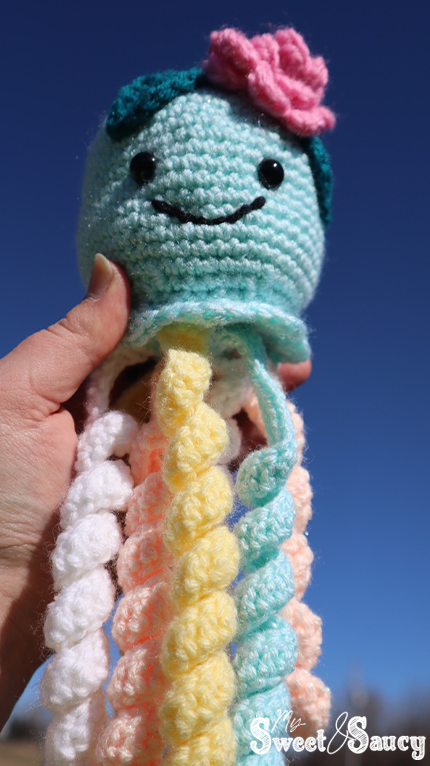 crochet octopus blue background