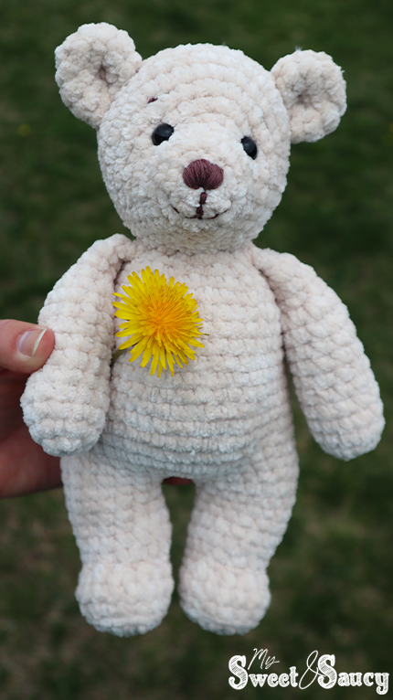 crochet tan teddy with dandelion