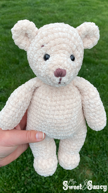 tan crochet teddy bright background