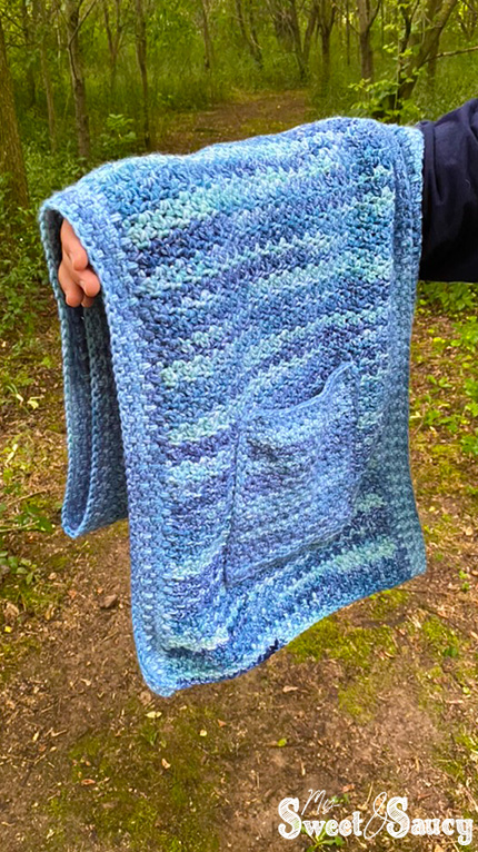 crochet pocket shawl over my hand
