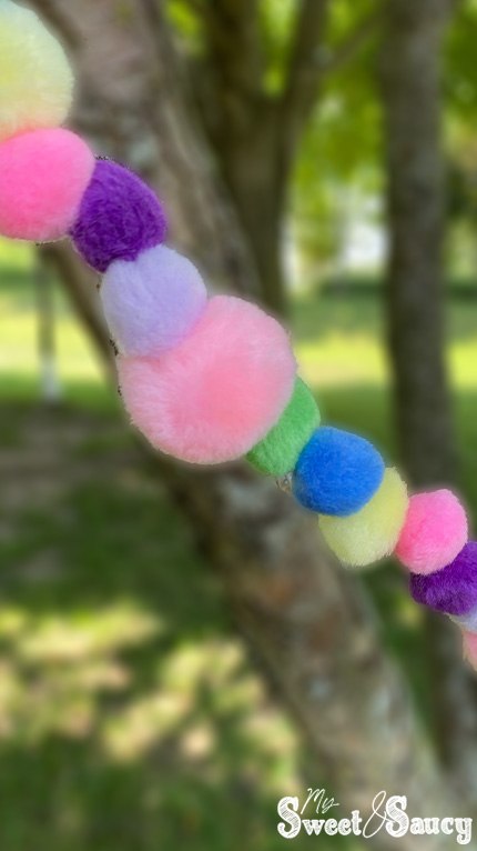 verticle pom pom from the tree