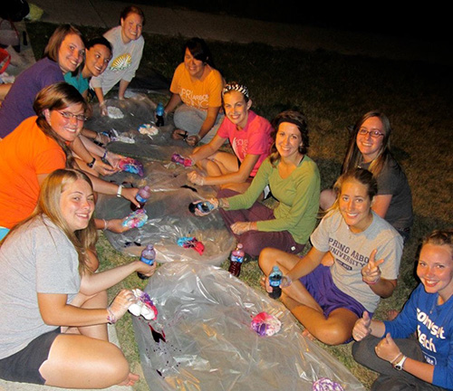 tie-dying shirts at camp